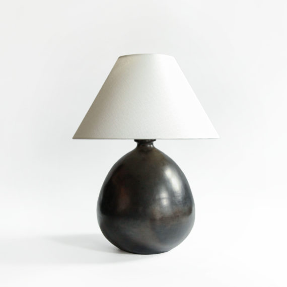 Black ceramic table lamp with natural white shade