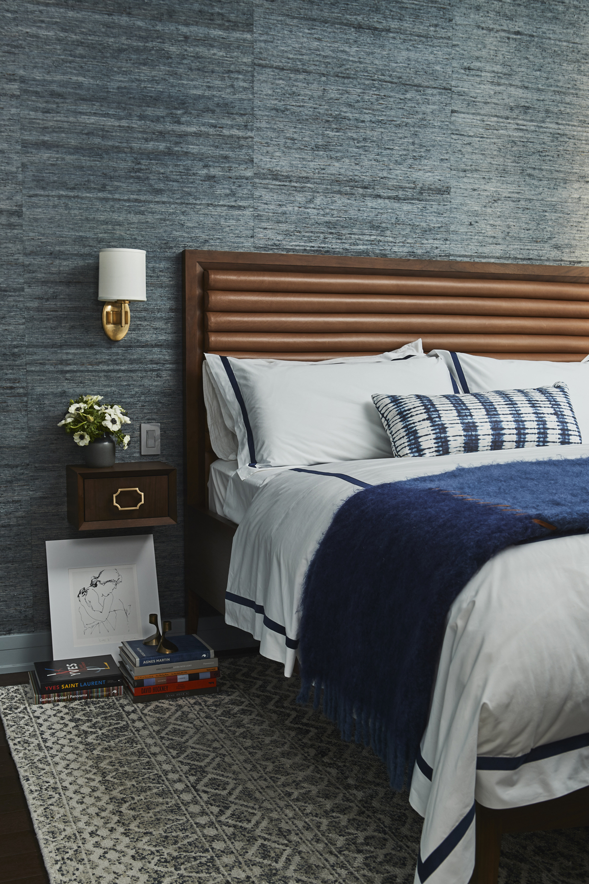 indigo printed burkina pillows and fabric, featured here in stone. bedroom designed by joanna jones interiors.