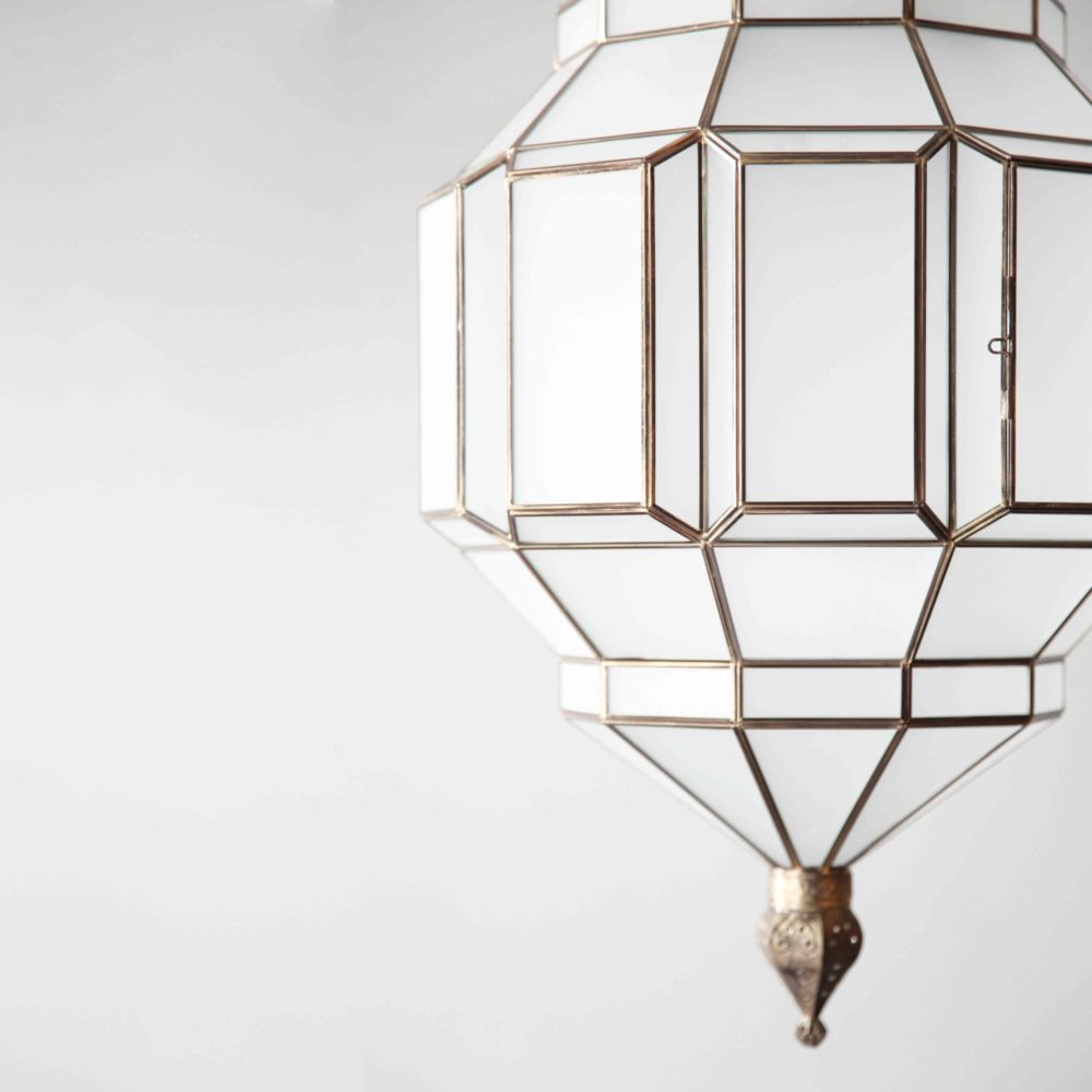brass and milk glass pendant light, a modern take on traditional moorish style.