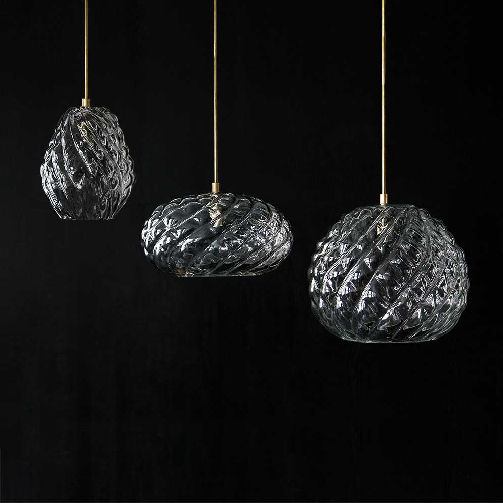 glass pendant light cluster with metal brass finishings.