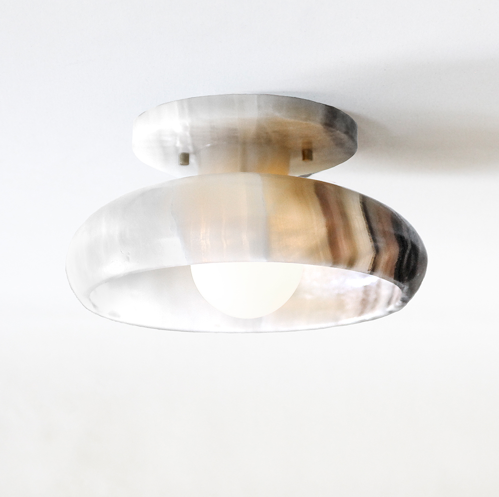 lit modern stone ceiling semi-flush mount light fixture in black and white onyx.