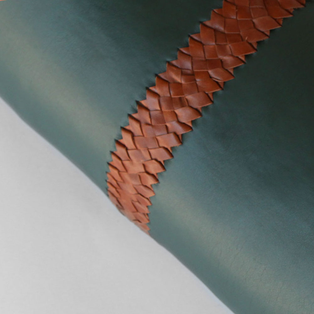 Talabarter-Almendra-Embroidered-Bolster-Pillow-Detail_palma2