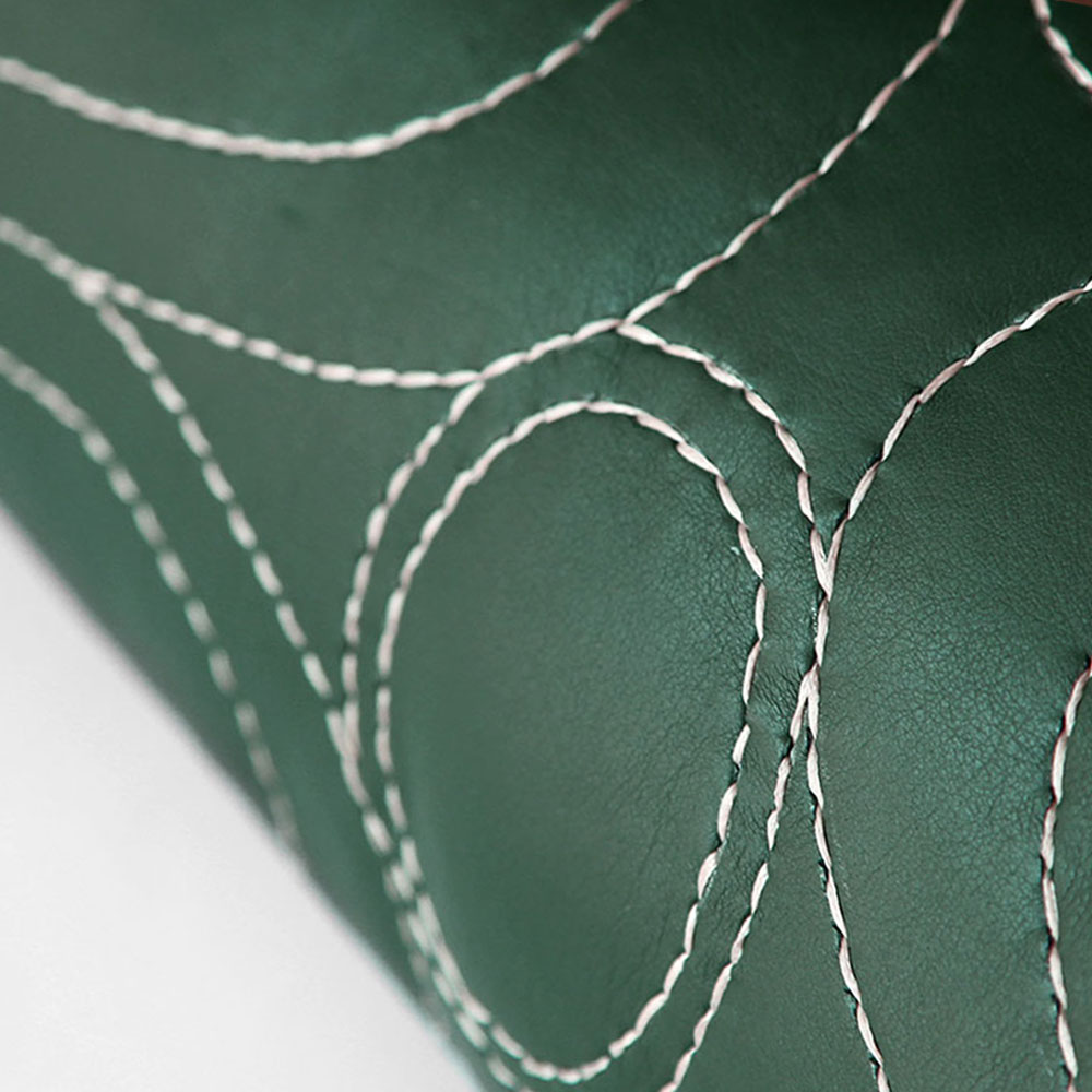 Talabarter-Almendra-Embroidered-Bolster-Pillow-Detail_palma2