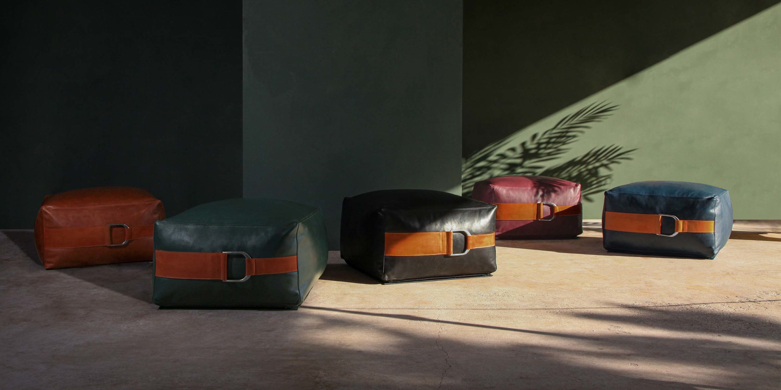 Talabartero Leather Collection, jewel tone leather poufs and bolster throw pillows