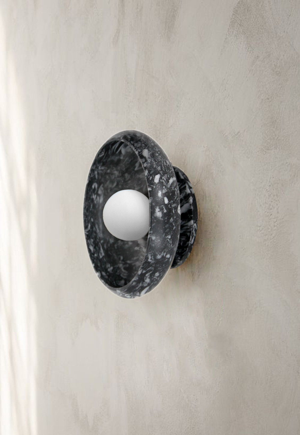 piedra sconce in grey onyx stone