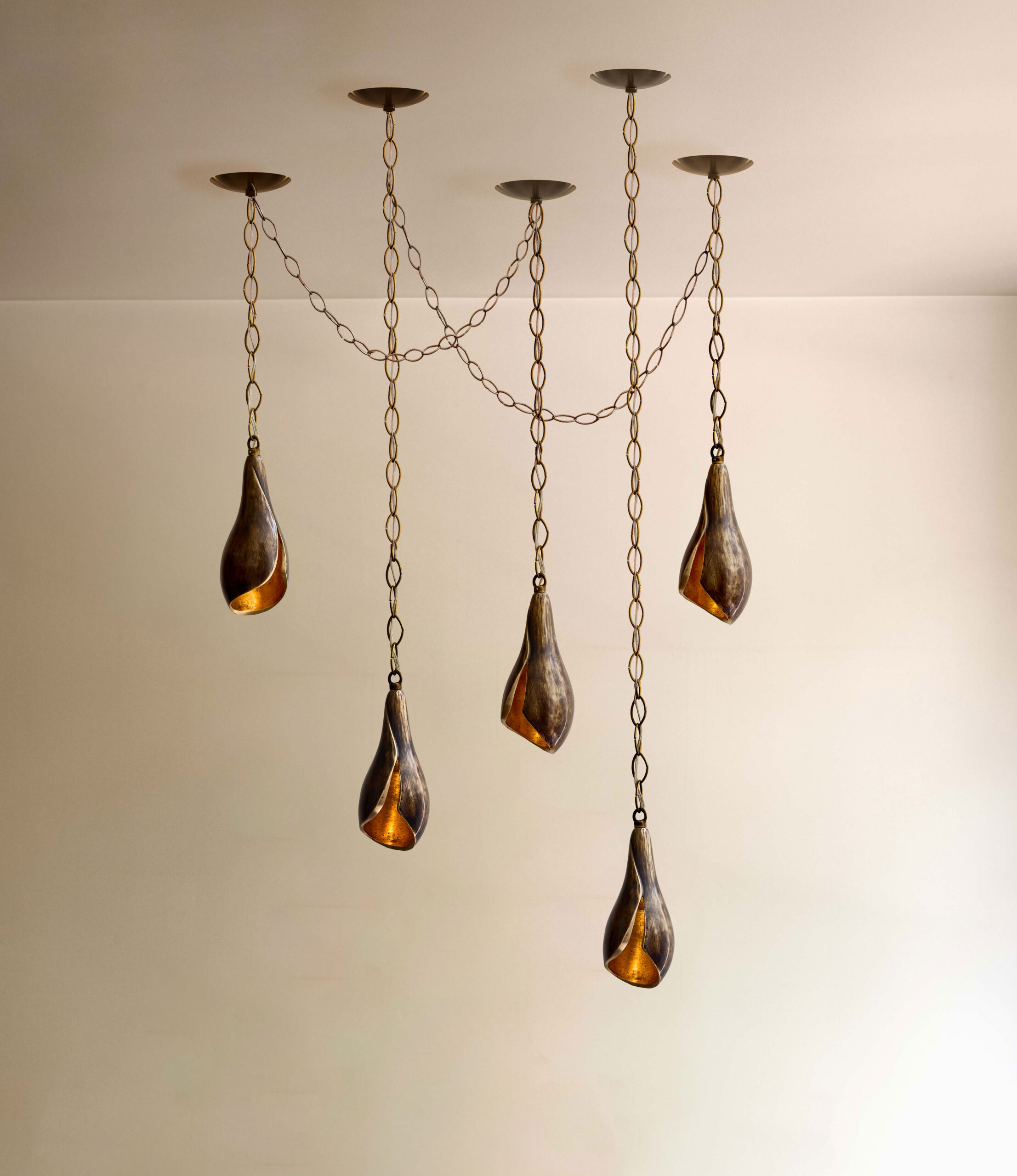 Swagged_Lirio-Pendants_Sepia-Lit swagged lirio