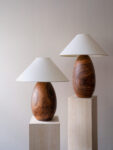 Pair of arbol table lamps on plinths