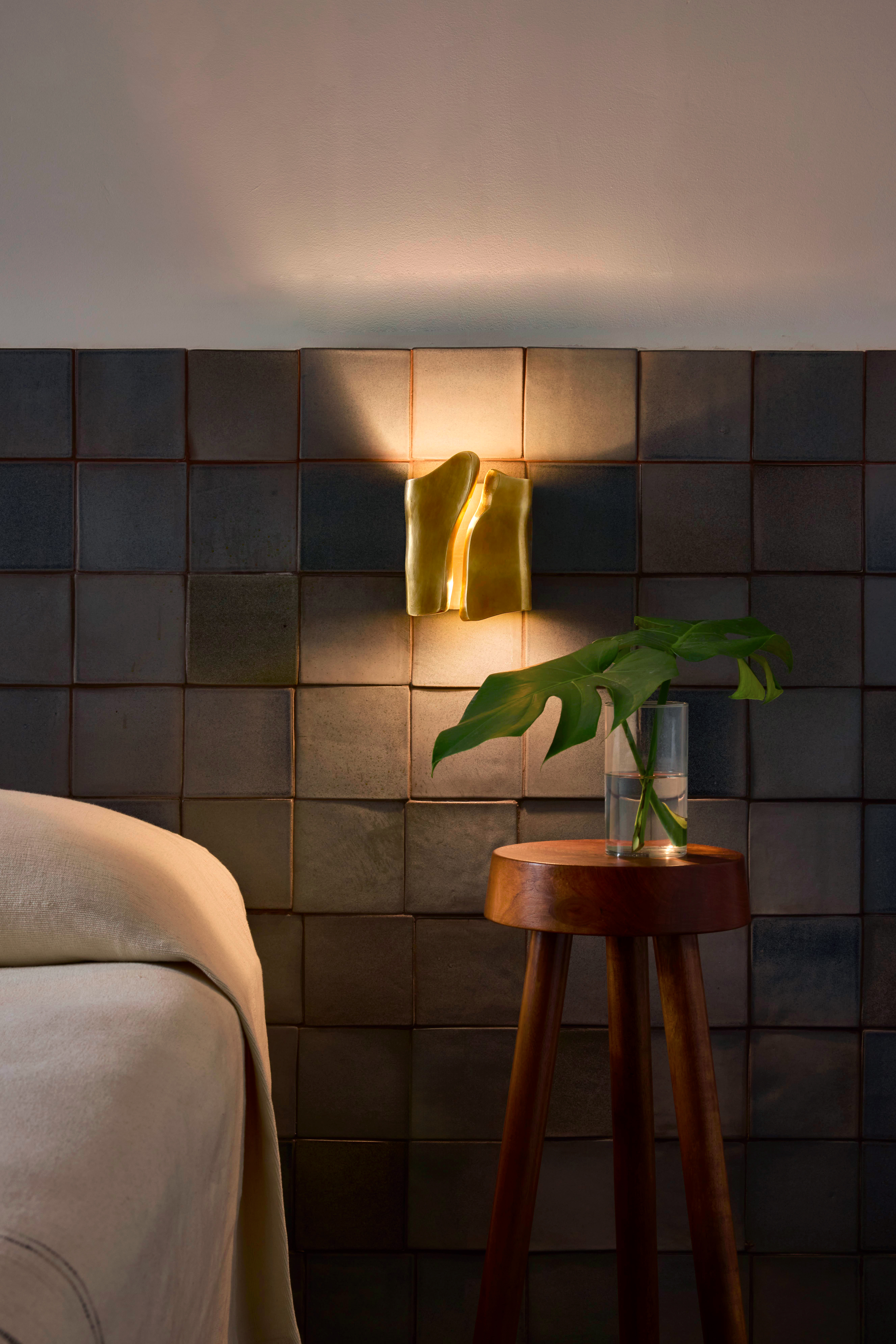 L'AvivaHome_Flor de Bronce_Lifestyle_Concept_PhotoByAlejandroRamirez_013_PRINT_V3 Capullo sconce in brasa finish lit