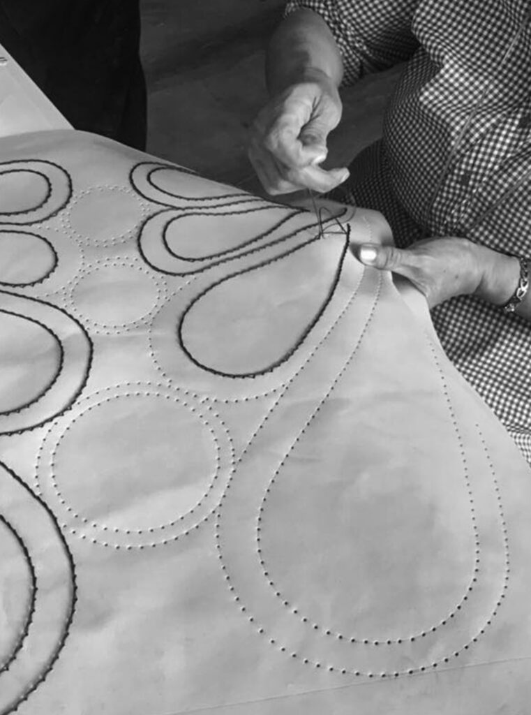 Talabartero_workshop_01 We've partnered with master craftsman Edgar Beltran Jaramillo and the skilled team in his Bogotá-based workshop to bring this collection to life. Each piece is crafted from a saturated jewel-toned color palette that draws on the works of Colombian artist Fernando Botero.